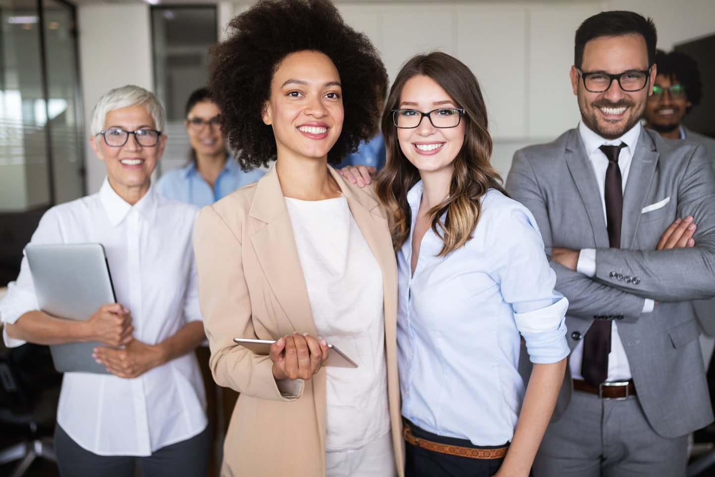 Group of successful business people in office